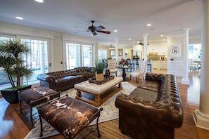 The living room provides an excellent spot to unwind and watch the game!