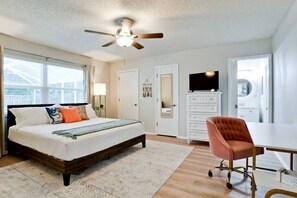 Spacious master bedroom with walkin closet, desk area, attached 3/4 bath, TV, Alexa, & USB ports.