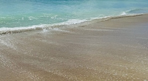 Where the sand meets the sea, and worries drift away.