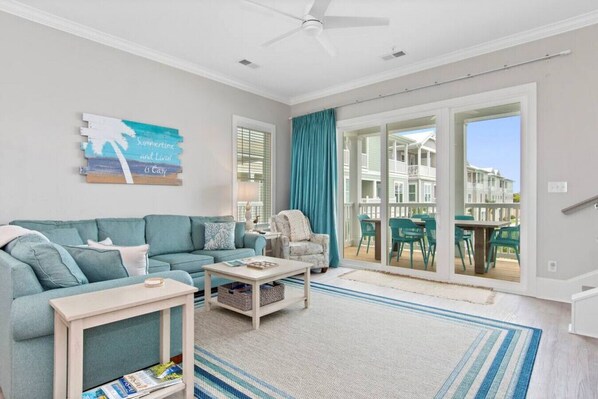 Let the sunshine in or block it out with a click!  "Summertime and Livin' is Easy" with remote control blackout curtains in the family room.