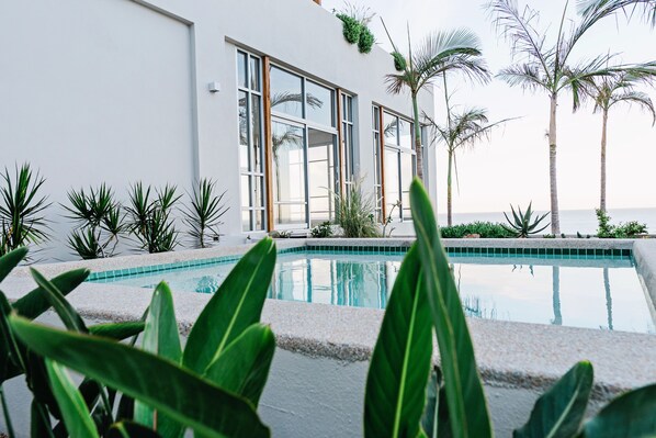 Hot tub with views. Yoga studio is perched out on the left.