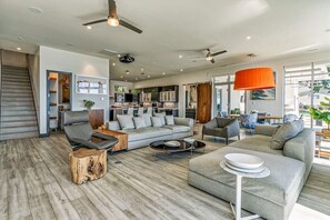 Living room with wall of windows facing Lake Norman