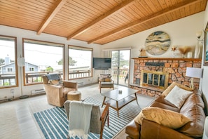 Enjoy large panoramic living room windows of the ocean