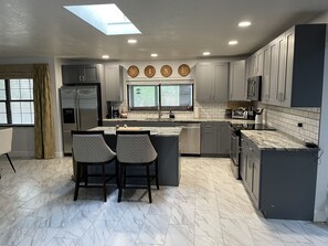 Full kitchen with island. 