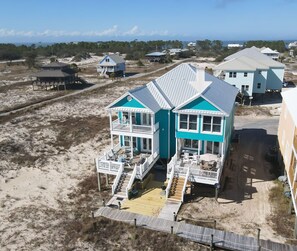 Direct beachfront duplex with a boardwalk & private deck