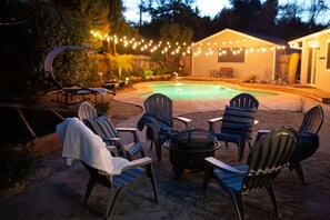 Nighttime Poolside Retreat: Enjoy evenings by the pool with string lights creating a magical setting. Perfect for stargazing or winding down with friends and family.