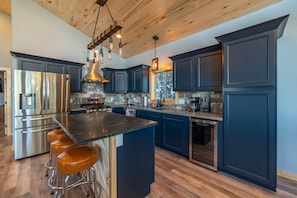 This is a kitchen that has everything.  Even a wine cooler built in.