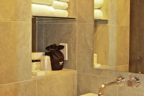 Full bathroom with a shower. Basic toiletries and towels are provided