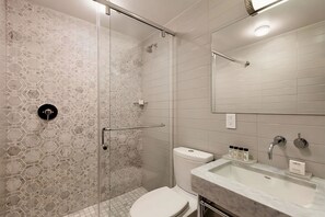 Full bathroom with a shower. Basic toiletries and towels are provided