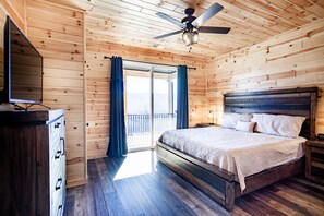 Relax in a charming bedroom with mountain views and cozy vibes