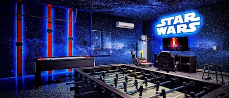 Game Room: Stylishly furnished with a Star Wars theme and cool lighting.