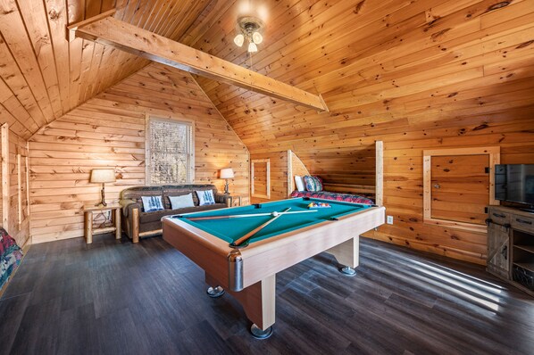 2 built-in beds, a sofa sleeper and pool table in loft!