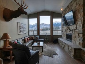 Large living room to gather with scenic views of the mountains in Yellowstone!