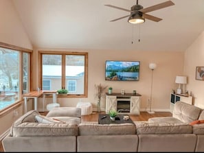 The living room is the heart of the home. The best vantage point of the lake!