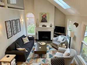 Family room w/wood burning fireplace