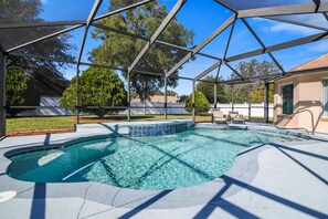 Private Pool with outdoor dining, lounge chairs, & grill