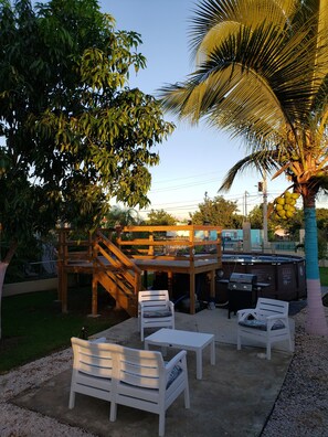 outdoor sitting area with BBQ grill