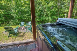 Hot tub with view of fire pit