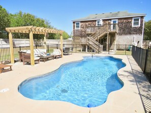 Pool Area/Deck - It's big and luxurious come take a swim in the 15 by 35 foot private pool or lounge under the pergola.