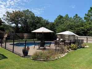 Fenced in Private Pool - Soak in the sun or grab a snack under the pergola. or table umbrella nestled beside the private pool.