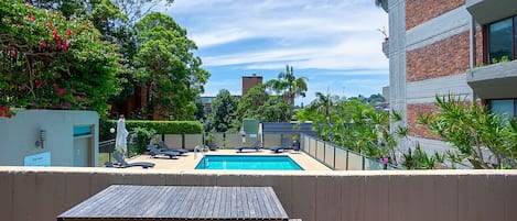 Patio looking out over the communal pool