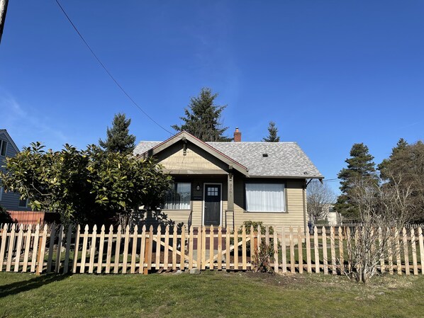 Front of the house. Fully fenced yard, cozy and full of craftsman character!