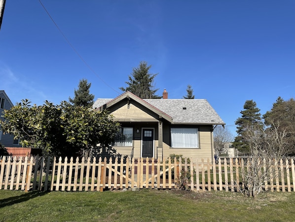 Front of the house. Fully fenced yard, cozy and full of craftsman character!