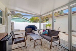 Screened in patio by pool