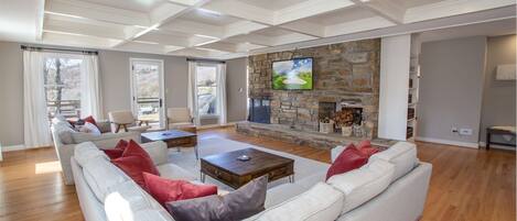 Welcome to Mountain Mojo! Great Room with Coffered Ceiling, Huge Stone Fireplace, and HD Smart TV