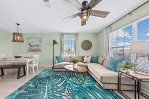 The living room and dining rooms are open to each other to allow the whole family to spend time together after a day of adventure.