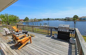 The deck is a beautiful place to relax, and watch the of boats passing by.