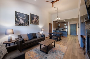 Furniture, Indoors, Living Room, Couch, Floor