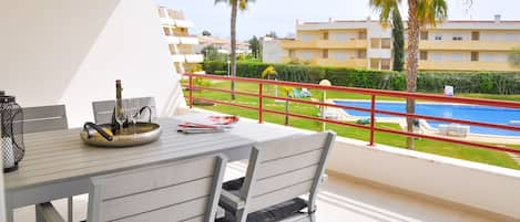 The apartment features a spacious terrace overlooking the condominium pool

#pool #summer #lovelystay