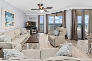 Living area with access to balcony with fabulous beach sunsets!