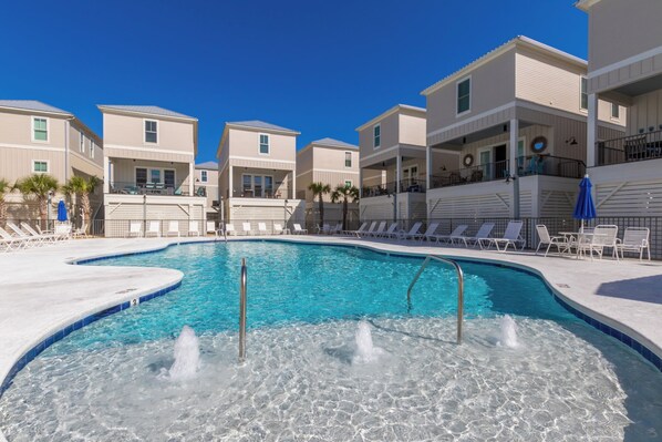 Resort pool with a splash pad, open year-around