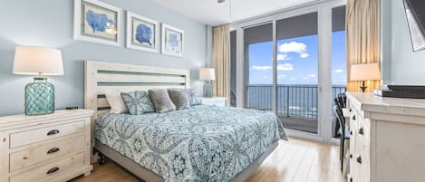 Primary Bedroom - King size bed with access to balcony & views of the gulf.