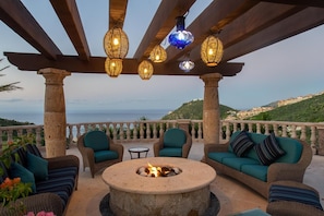 On the patio in the evening at Villa Maria.