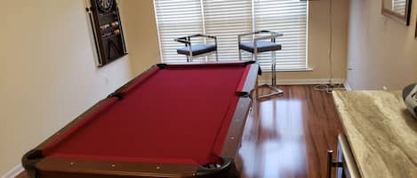 room for playing pool, hanging out, watching sports/tv