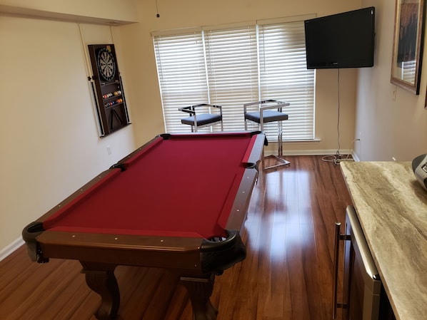 room for playing pool, hanging out, watching sports/tv