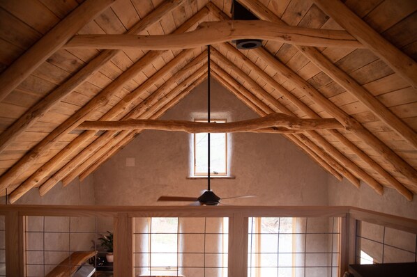 Detail of the beautiful round poles used to frame the roof.