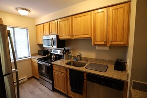 Kitchen with Updated Appliances in Condo at Waterville Valley