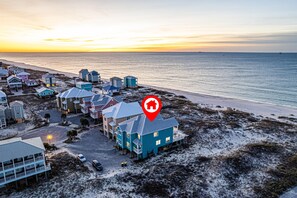 Prime oceanfront property in Gulf Shores with expansive parking for 5 Cars - experience stunning views and ultimate space for your beachfront getaway.