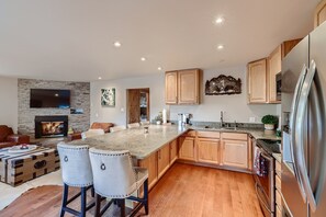 Full kitchen with stainless steel appliances