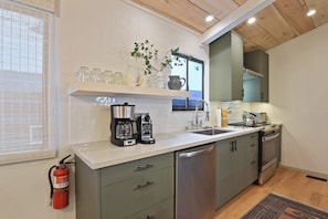 Full kitchen with coffee maker, toaster, dishwasher and more!