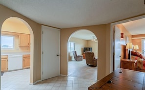 Entry way that adjoins kitchen, family room, master bedroom and guest bedroom 