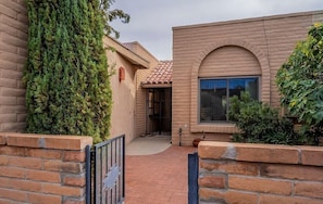 Entry gate leading to front patio and front door.