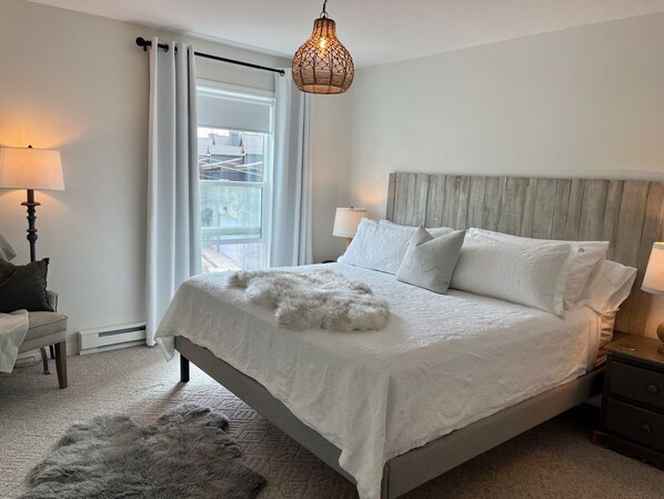 Main bedroom with King Size bed, smart tv with Telus tv channels and Netflix 