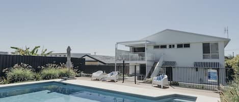 Family-friendly pool, fire pit and BBQ dining area and upper level deck