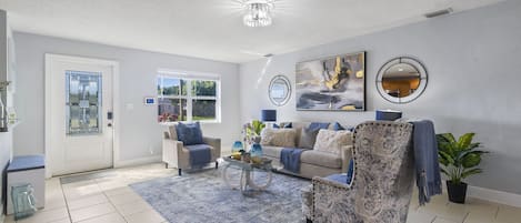 Whether it's a movie night with loved ones or simply lounging and enjoying each other's company, our palm-themed living area is the perfect gathering spot for quality time and making cherished memories.