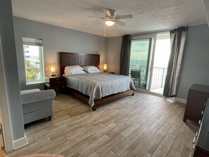 Spacious master bedroom w/ balcony access. Enjoy sunrise from the comfort of bed